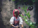 Grietje voor het huisje van de heks van <a href="/lemma/Hans_en_Grietje" title="Hans en Grietje">Hans en Grietje</a> in <a href="/lemma/1981" title="1981">1981</a>