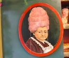 Portretje van een dame met suikerspinkapsel, aan de muur in het <a href="/lemma/Suykerhuys" class="mw-redirect" title="Suykerhuys">Suykerhuys</a>. (Foto: Ilona, 2004)