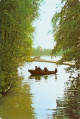 De <a href="/lemma/Roeivijver" title="Roeivijver">Roeivijver</a> op de oude locatie in de jaren 70. Op de achtergrond, achter de pier, de houten scheiding met de toenmalige kanovijver.