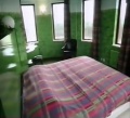 Bed in de <a href="/lemma/Golfers_Suite" title="Golfers Suite">Golfers Suite</a> in het <a href="/lemma/Efteling_Hotel" title="Efteling Hotel">Efteling Hotel</a>, <span class="redlink">1993</span>.