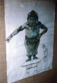 Figuur in de wachtrij van <a href="/lemma/De_Indische_Waterlelies" title="De Indische Waterlelies">De Indische Waterlelies</a>, tentoongesteld op de <a href="/lemma/Anton_Pieck-tentoonstelling_(1995)" title="Anton Pieck-tentoonstelling (1995)">Anton Pieck-tentoonstelling (1995)</a> in de <a href="/lemma/Dioramahal" class="mw-redirect" title="Dioramahal">Dioramahal</a>