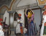 Buikdanseres en toeschouwers in het <a href="/lemma/Voorportaal" title="Voorportaal">Voorportaal</a> van de gevangenis, <a href="/lemma/Fata_Morgana" title="Fata Morgana">Fata Morgana</a> in haar openingsjaar <span class="redlink">1986</span>