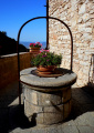 Het originele <a href="/lemma/Putje_van_Assisi" title="Putje van Assisi">Putje van Assisi</a> aldaar, aug 2017