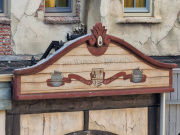 <a href="/lemma/Raveleijn" title="Raveleijn">Raveleijn</a>, gevelbord in de arena: Het Wapen van Raveleijn / Eten wat de pot schaft